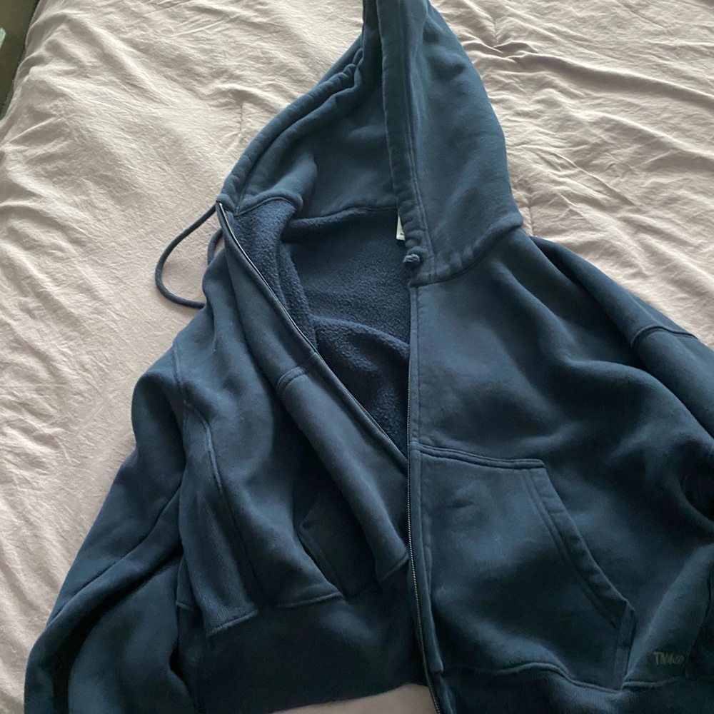 TNA Navy Hooded Zip-Up sweater and patching flare sweatpants,